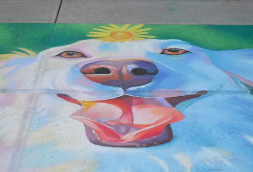 Artist Kyra Liberski created the chalk art piece, “Bubba,” at the 2023 Centennial Chalk Art Festival.